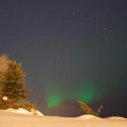 Aurora over rivier, Rovaniemi